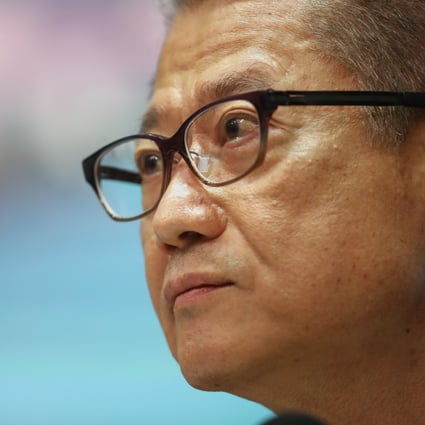 Financial Secretary Paul Chan said the economy would get a 2 per cent boost from all measures announced. Photo: Winson Wong