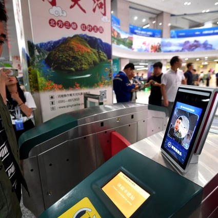A man gets ready to walk through a subway turnstile equipped with facial recognition payment system at Zijingshan station in Zhengzhou, central China's Henan Province, Sept. 27, 2019. Photo: Xinhua