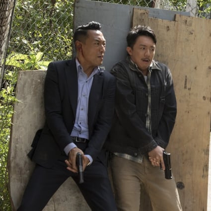 Philip Keung (left) and Louis Cheung in a scene from A Witness out of the Blue (category: IIB; Cantonese), directed by Fung Chih-chiang and also starring Louis Koo.