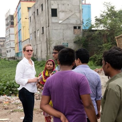 Dana Thomas (left) in Bangladesh carrying out research for her new book Fashionopolis: The Price of Fast Fashion and the Future of Clothes. Photo: Clara Vannucci