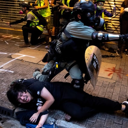 Hong Kong police clash with anti-government protesters during a demonstration in Causeway Bay on October 6. Photo: Reuters