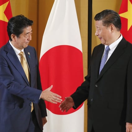 Japanese Prime Minister Shinzo Abe and Chinese President Xi Jinping. Photo: EPA