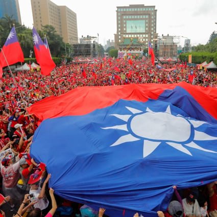 Supporters of the opposition KMT at a rally in Taipei in June. Photo: AFP