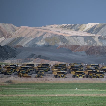 Trucks parked at the Tavan Tolgoi coal mine in the southern Gobi Desert on June 26, 2016. Photo: Agence France-Presse