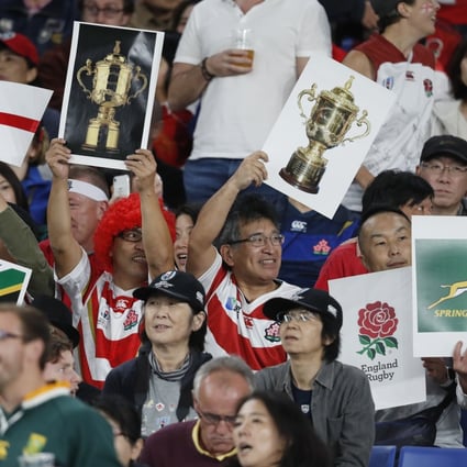 Japanese fans cheer their favourite teams during the Rugby World Cup final in Yokohama. Photo: Reuters