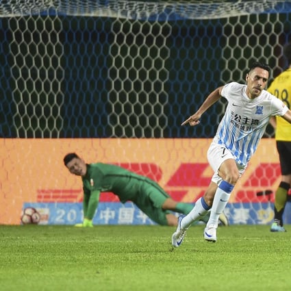 Eran Zahavi scores for Guangzhou R&F during the 2017 Chinese Super League season. Photo: Xinhua