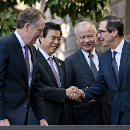 US trade representative Robert Lighthizer(left) and US Treasury secretary Steven Mnuchin (right) with China's Commerce Minister Zhong Shan during October’s trade talks in Washington. Photo: Bloomberg