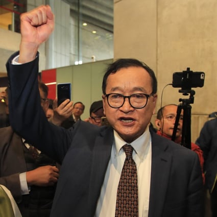 Sam Rainsy at Charles de Gaulle airport. Photo: AP