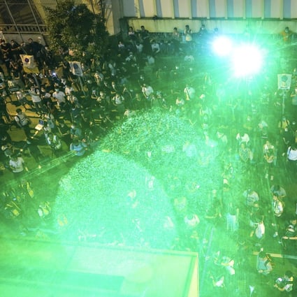 Lasers have become part of protesters’ toolkit since the unrest erupted in the summer. Photo: Winson Wong
