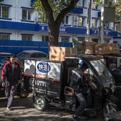 Delivery drivers in Beijing prepare for Singles' Day. Photo: EPA-EFE