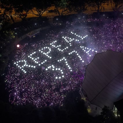 A Pink Dot event in Hong Lim Park in Singapore calls for the repeal of the law that criminalises sexual acts between men. Photo: EPA