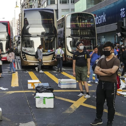 Anti-government protesters block traffic in Mong Kok. Photo: Edmond So