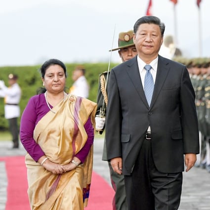 Chinese President Xi Jinping, with Nepali President Bidya Devi Bhandari, reviews a guard of honour during a welcome ceremony in Kathmandu on October 12, 2019. Photo: Xinhua