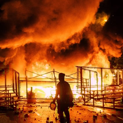 Some church workers are appearing regularly at the protest front lines to be a buffer between police and demonstrators. Photo: Yeung Kwan