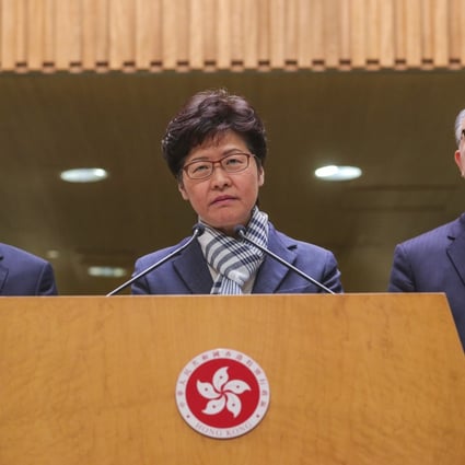 Chief Executive Carrie Lam Cheng Yuet-ngor (centre) at a press conference with Secretary for Security John Lee Ka-chiu (left) and Secretary for Transport and Housing Frank Chan Fan on November 11. The government can announce an independent inquiry and restart political reforms. Doing the right thing is not a sign of weakness. Photo: May Tse