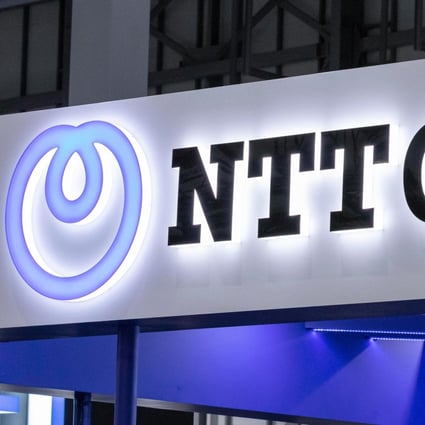 A logo of NTT Group is seen at a conference in Tokyo on April 3 this year. NTT said it was forming a global technology and services provider by combining capabilities of 28 of its companies, including NTT Communications Corp, Dimension Data Holdings and NTT Security Corp. Photo: Alamy