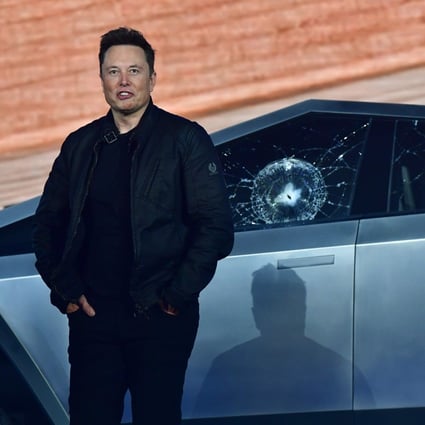 Tesla chief executive Elon Musk stands in front of the shattered windows of the newly unveiled Cybertruck, an electric battery-powered pickup truck, at the Tesla Design Centre in Hawthorne, California on November 21. Photo: Agence France-Presse