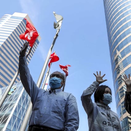 Protesters were out on the streets again during their lunch hour on Friday as part of the daytime campaign launched last week by the anti-government movement. Photo: Xiaomei Chen