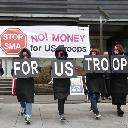 South Korean protesters rally against the government’s financing of US troops. Photo: EPA