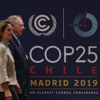 Spanish acting Prime Minister Pedro Sanchez (L) visits the IFEMA venue that host the UN Climate Change Conference COP25. Photo: dpa