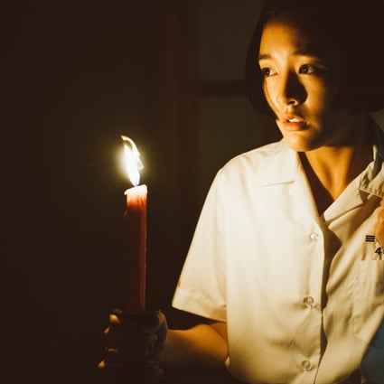 Gingle Wang Ching in a still from Detention (category: IIB; Mandarin), directed by John Hsu Han-chiang. Tseng Jing-hua and Fu Meng-po co-star.