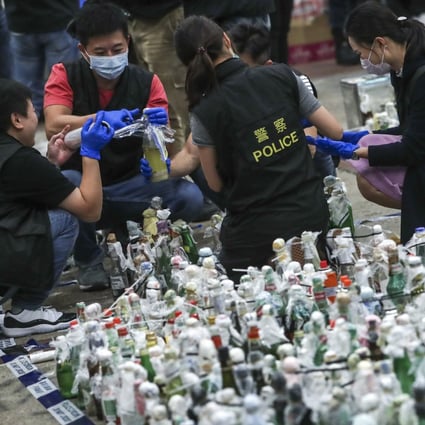A total of 3,989 petrol bombs, 1,339 pieces of explosives and 601 bottles of corrosive liquid were found at PolyU. Photo: Sam Tsang