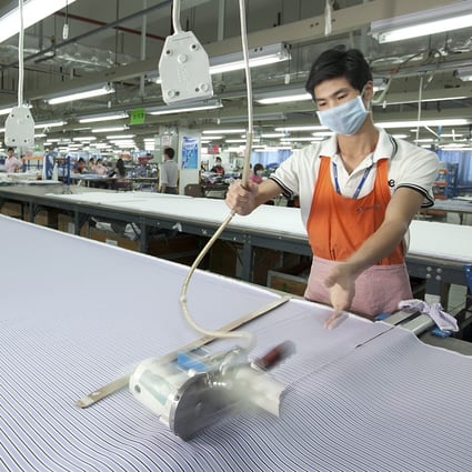 The Caixin/Markit Manufacturing Purchasing Managers’ Index (PMI) edged up to 51.8 in November from 51.7 in October. Photo: Bloomberg
