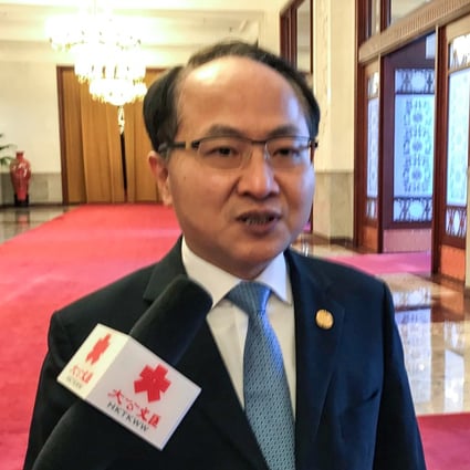Wang Zhimin was keen to sound upbeat when he faced the media. Picture: Jun Mai