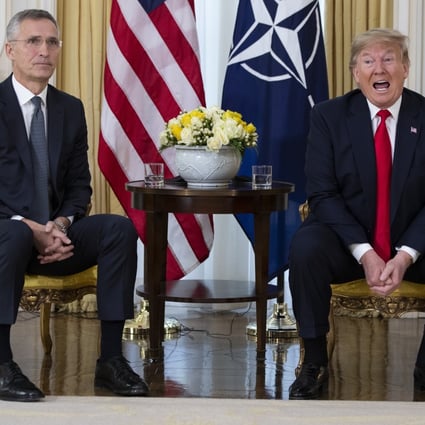 US President Donald Trump (right) met with Nato secretary general Jens Stoltenberg in London. Photo: AP