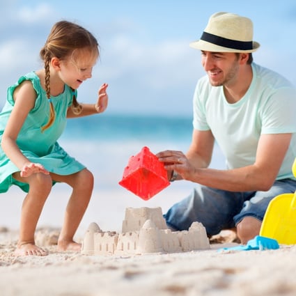 If you want to give someone something that will make them feel closer to you, give an experience such as family holiday, researchers say. Despite the cost and stress involved, a family holiday is well worth having. Photo: Shutterstock