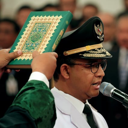 Anies Baswedan is sworn in as the governor of Jakarta. Photo: Reuters