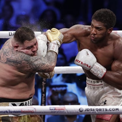 Defending champion Andy Ruiz Jnr is on the end of a huge right hand from Anthony Joshua. Photo: AP