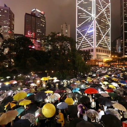 Finance workers hold a rally at Chater Garden, Central, urging the government to respond to protesters’ demands. Photo: K.Y. Cheng
