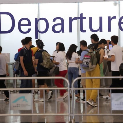 Official figures show that passenger numbers at Hong Kong International Airport experienced their steepest drop Dickson Lee