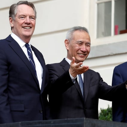 China's Vice-Premier Liu He gestures to the media between US Trade Representative Robert Lighthizer (left) and Treasury Secretary Steven Mnuchin before trade negotiations in Washington on October 10. Photo: Reuters