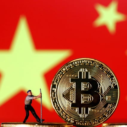 Mu Changchun, the head of the People’s Bank of China’s digital currency research institute, said China’s new digital currency was different to bitcoin. Photo: Reuters