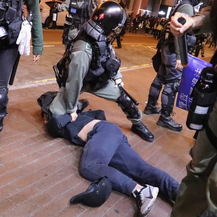 Police arrest a protester in Mong Kok on Christmas Day. Photo: Felix Wong
