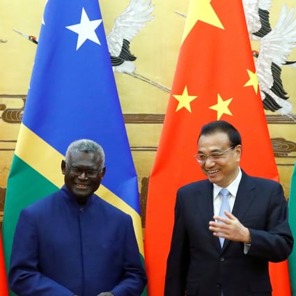 Solomon Islands Prime Minister Manasseh Sogavare and Chinese Premier Li Keqiang at an October signing ceremony at the Great Hall of the People in Beijing. Photo: Reuters