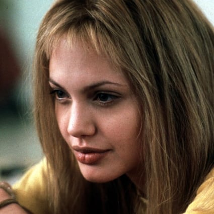 Angelina Jolie won an Oscar, Golden Globe and Screen Actors Guild Award for her turn as the manipulative, charismatic sociopath wardmate Lisa in the 1999 film Girl, Interrupted. Photo: Reuters