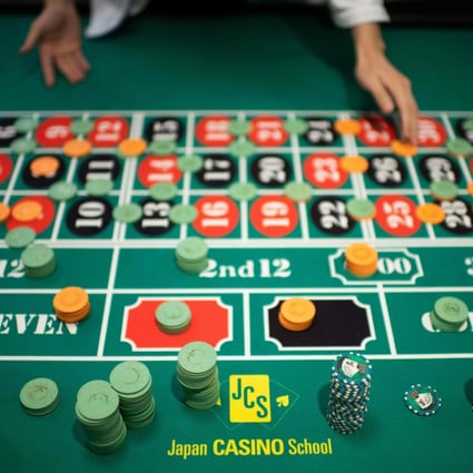 A student practising the game of roulette at the Japan Casino School in Tokyo. Photo: AFP