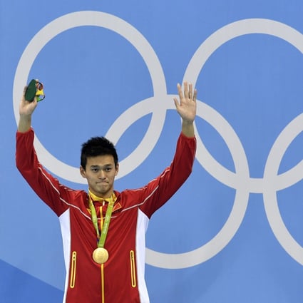 China’s Sun Yang celebrates with the gold medal in the men’s 200m freestyle at the 2016 Rio Olympics. Photo: AP
