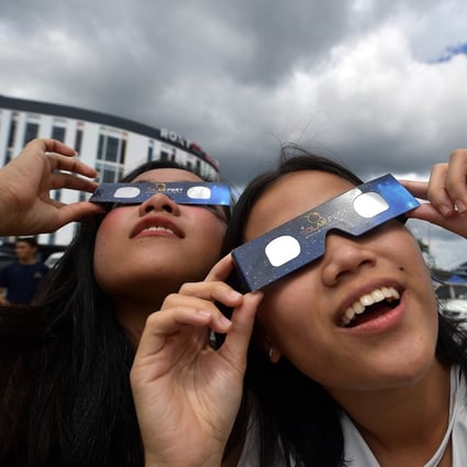 People gear up for a solar eclipse at the National Planetarium in Kuala Lumpur, Malaysia, on December 24, two days before the solar eclipse on December 26. Malaysia launched its Vision 2020 plan in 1991 – to lay out a vision 30 years into the future was breathtaking in its audacity. Photo: Bernama / DPA