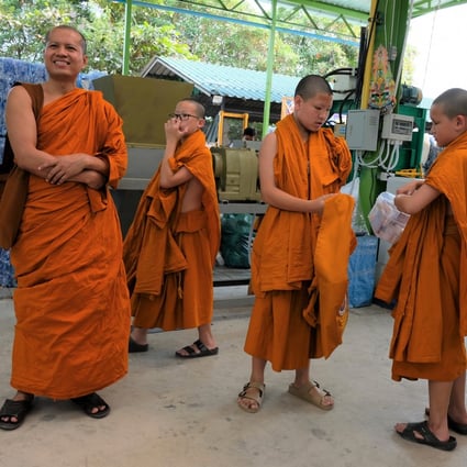 The robes that monks in a temple in Thailand are wearing are made from plastic bottles – a recycling initiative set up by acting abbot Phra Maha Pranom Dhammalangkaro. Photo: Tibor Krausz