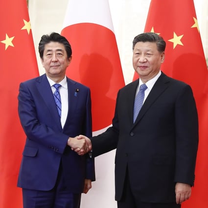 Chinese President Xi Jinping told Japanese Prime Minister Shinzo Abe in Beijing last month that the two countries should not see each other as a threat. Photo: DPA