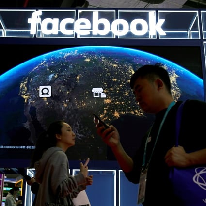A Facebook sign is seen at the second China International Import Expo event in Shanghai on November 6, 2019. Photo: Reuters