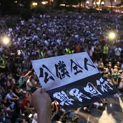 Thousands of civil servants gathered for a lawful rally in Central last August. A handful of their colleagues have been arrested for joining illegal events. Photo: Felix Wong