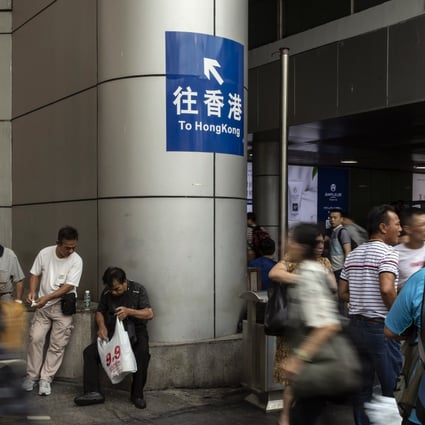 Under the so-called one-way permit scheme, up to 150 mainland Chinese can settle in Hong Kong every day. Photo: Bloomberg