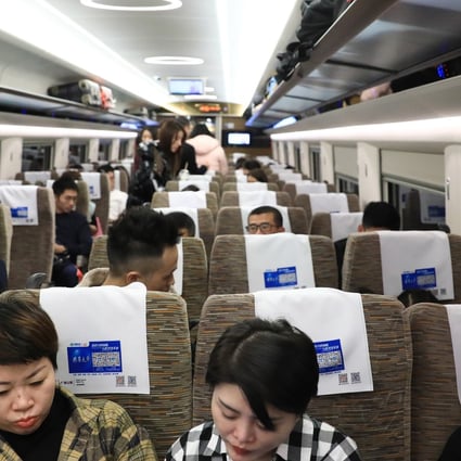 Passengers on the high-speed train from Beijing to Hong Kong. Thailand’s case is the first reported infection outside China. Photo: May Tse