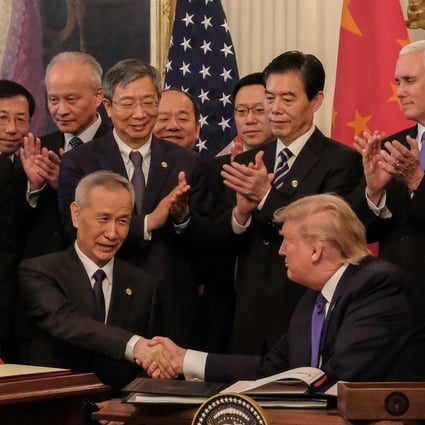 Chinese Vice-Premier Liu He and US President Donald Trump shake hands after signing the phase one trade deal at the White House in Washington on January 15. Photo: EPA-EFE