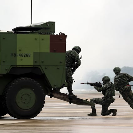 Taiwanese soldiers manoeuvre during a military drill ahead of Taiwan's National Day in Taoyuan in 2018. Photo: EPA-EFE